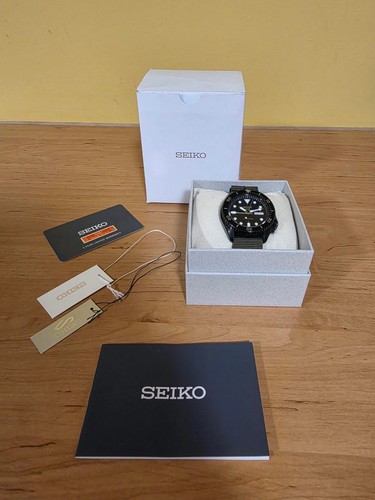 Black seiko skx - 5, 39mm